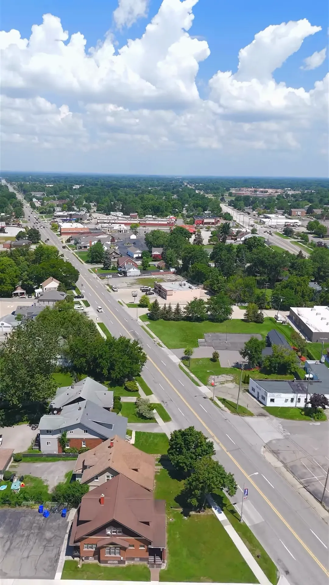 Aerial view of Utica Road in Fraser with a stand-alone commercial building