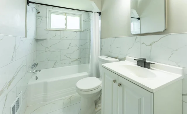 Updated white bathroom in the Roseville ranch