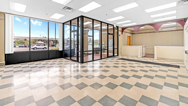 Open interior of a former urgent care unit with high ceilings
