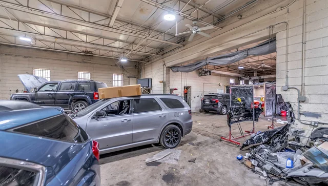 Collision shop bays inside the Warren industrial building